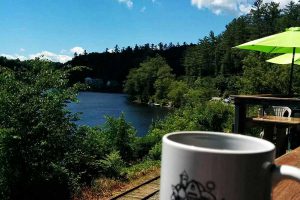 Enjoy a hot cup of coffee in front of the Gatineau River